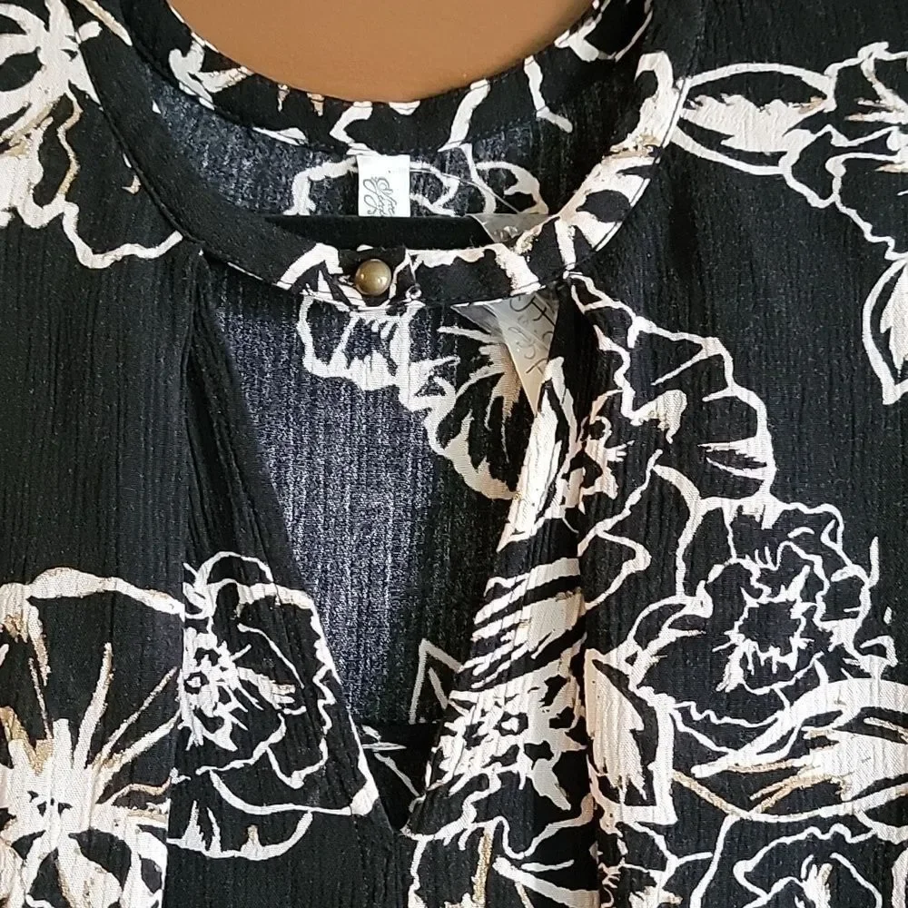 Free People-blk/iv/tan long sleeved print top with band around neck. S/M. NWT.